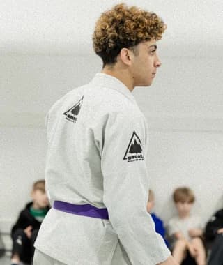 BJJ student in gi